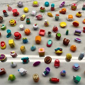 Shopkins Mini Figures lot of 90 plus 9 bags / 4 crates in a Kinbin carrying case